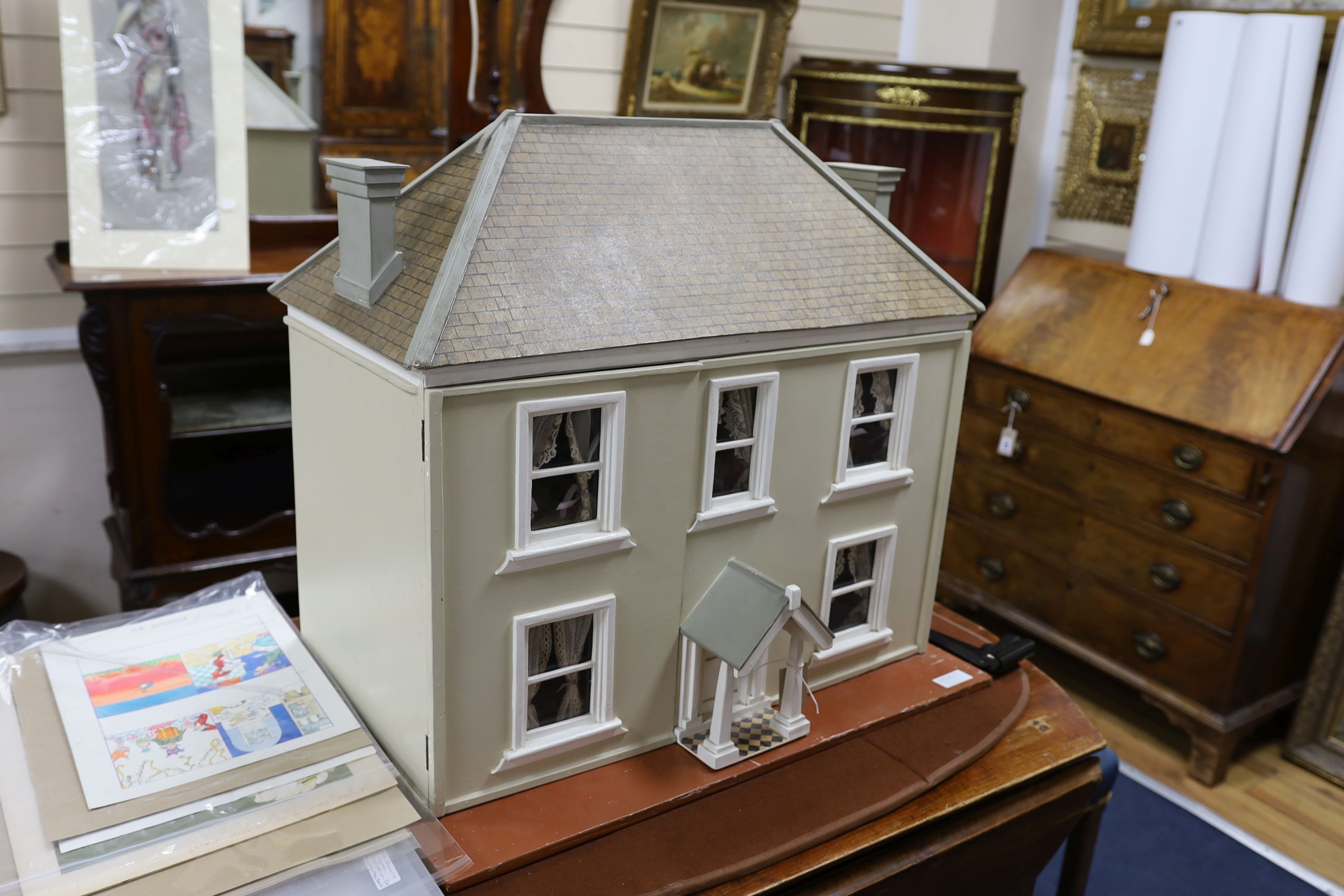 A dolls house, length 74cm, depth 39cm, height 66cm